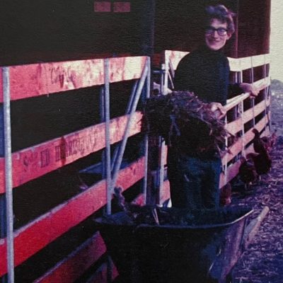 Depicting a 31 year old Elias shoveling manure on the Copake farm