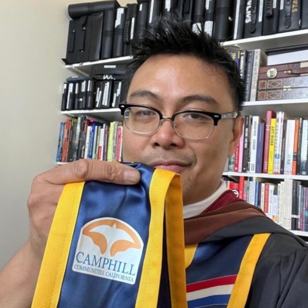 Julius displaying his Camphill patch on his Graduation Stole